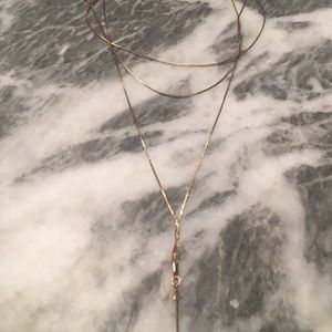 Long (chocker to body chain) gold necklace